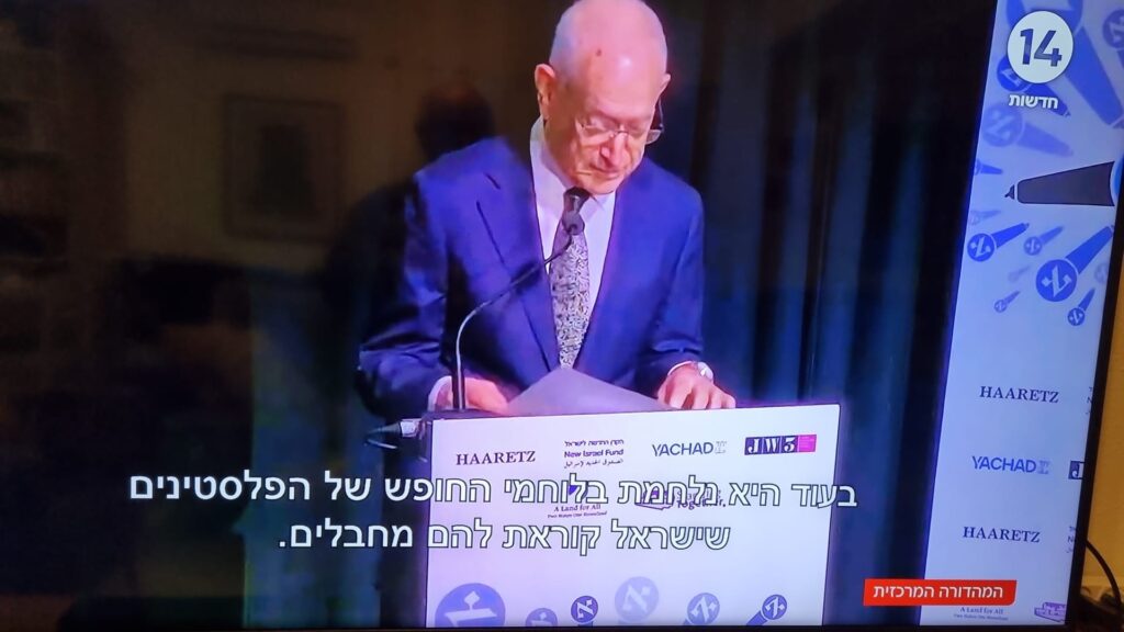 [עמוס שוקן מדבר על "לוחמי החופש של הפלסטינים"... התמונה היא צילום מסך]